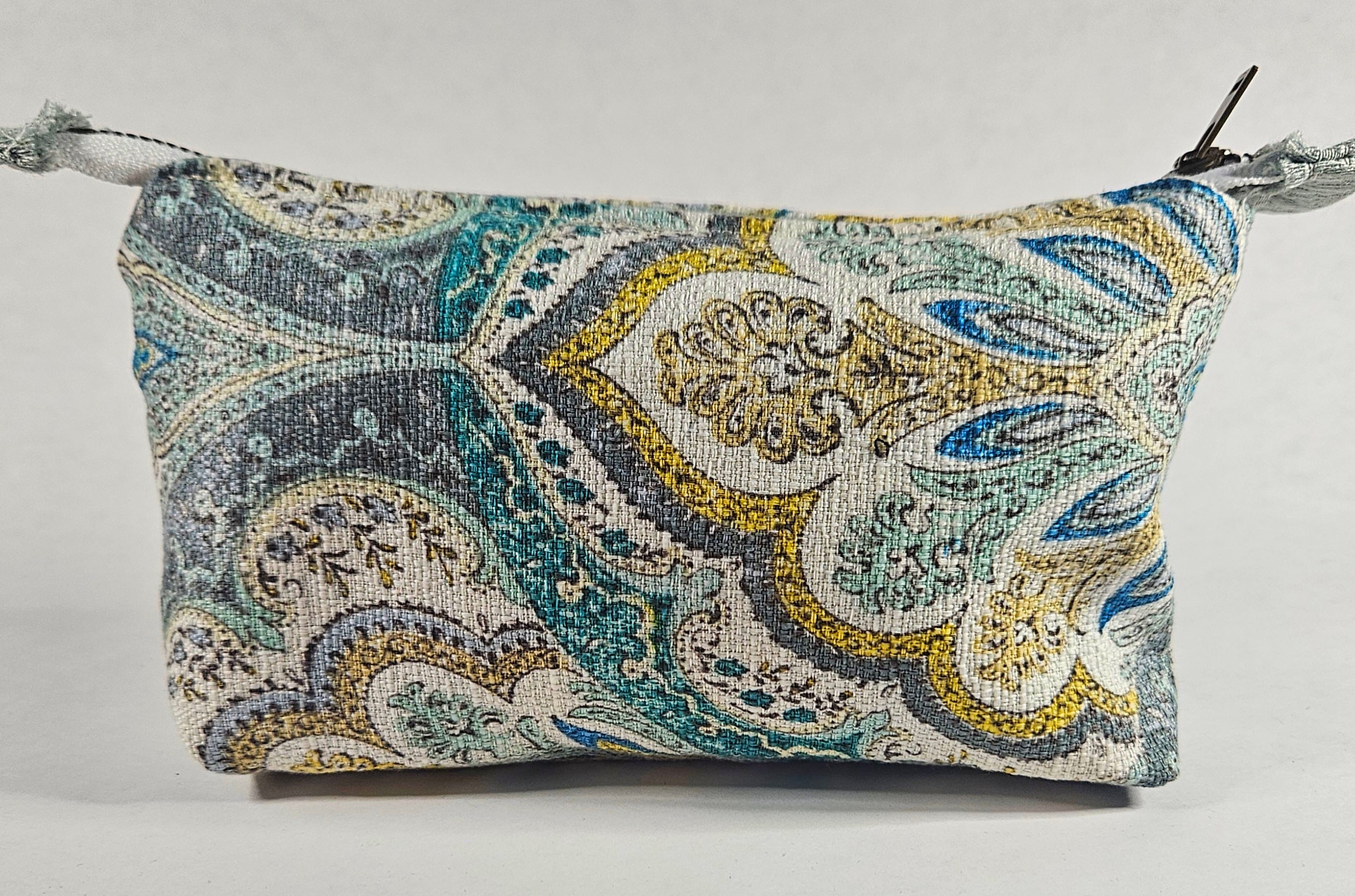 Handmade Up-Cycled, Lined, Zipper Pouch. Light blue Stylized Floral
